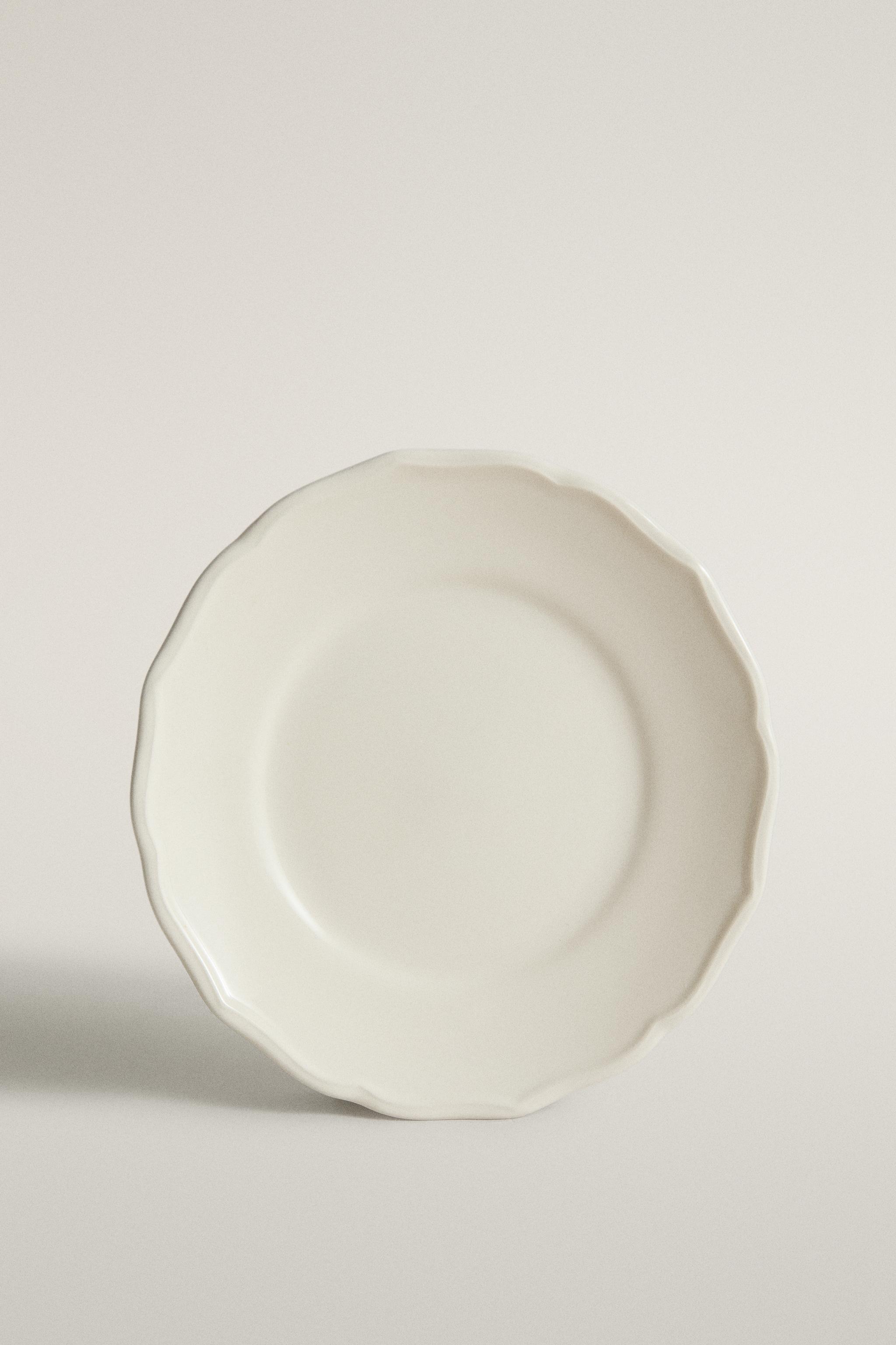 ASSIETTE À PAIN FAÏENCE BORD RELIEF